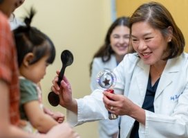 child being examined by optometrist