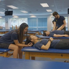 Osteopathic medicine student Beverly examines a patient.