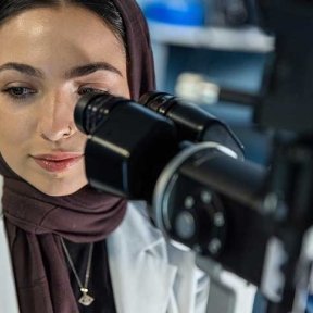 Optometry student with equipment