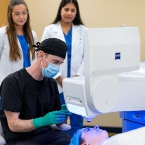 Dr. Robert Fintelmann performing refractive surgery at the Midwestern University Eye Institute.