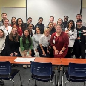 Group photo of faculty and presenters.
