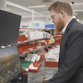 Sean Tregesser working in a pharmacy lab.