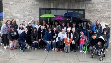 Participants from the Speech-Language Pathology Program gather for a group photo at the Chicago Walk for Apraxia