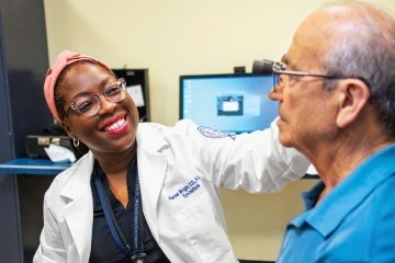 Optomistrist provides health care to patient
