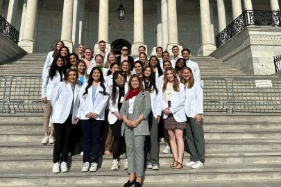 CCOM stand outside Capitol Hill