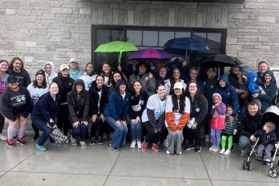 Participants from the Speech-Language Pathology Program gather for a group photo at the Chicago Walk for Apraxia.