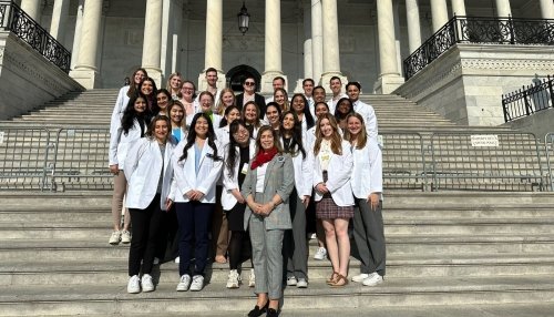 CCOM stand outside Capitol Hill