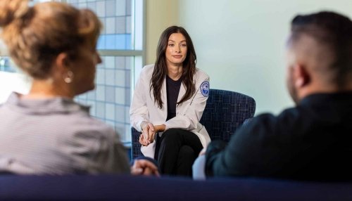 Clinical Psychologist discussing with her patients