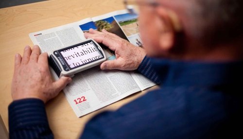 patient using low vision tools