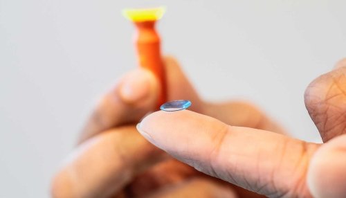 Contact lens on finger