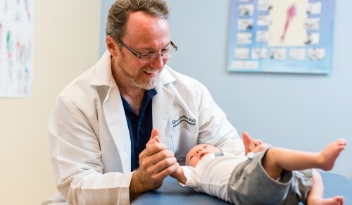 Doctor with baby.