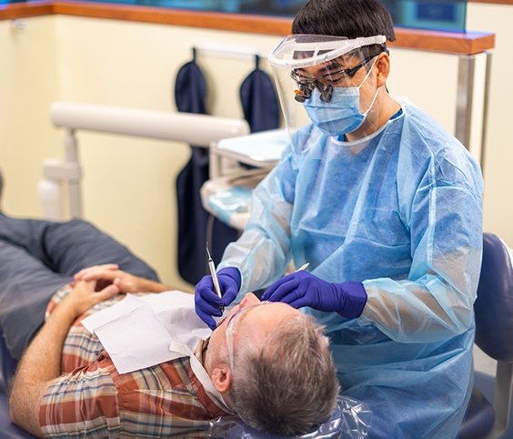 Dental student helping out at the Illinois Clinic 